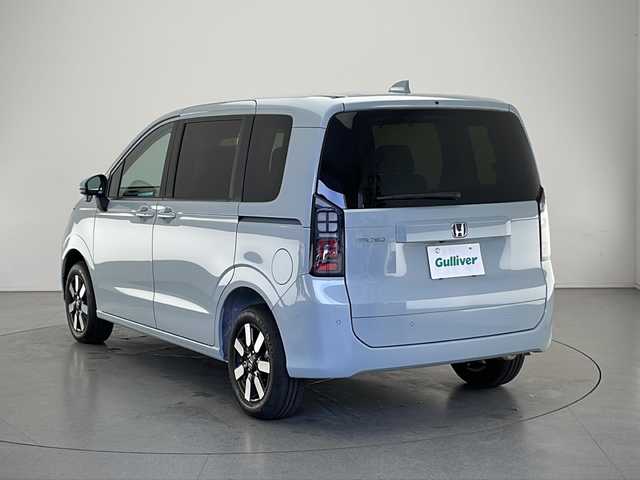 ホンダ フリード AIR EX 長野県 2025(令7)年 0.1千km フィヨルドミストパール 4WD/登録済未使用車/USB入力端子/寒冷地仕様/クルーズコントロール（追従あり）/レーンキープアシスト/横滑り防止装置/パーキングセンサー警報/踏み間違い衝突軽減システム/路外逸脱抑制機能/ステアリングスイッチ/3列シート/ウォークスルー/シートヒーター（前席）/両側パワースライドドア/カーテンエアバック/電格ミラー/LEDヘッドライト/オートライト/BSM/純正15インチ夏タイヤ/スマートキー/スペアキー1本