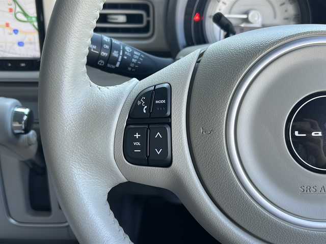 スズキ ラパン X 広島県 2024(令6)年 1.1万km テラコッタピンクメタリック/ソフトベージュ 2トーン 禁煙車/フルタイム４WD/デュアルカメラブレーキサポート/車線逸脱警報/オートハイビーム/純正８型ナビ（CN-FZ896）/・フルセグTV/・CD/Bluetooth/SD/REC/USB/全方位モニター/ステアリングスイッチ/革巻きステアリング/オートライト/D/Nシートヒーター/LEDヘッドライト/コーナーセンサー/電動格納ミラー/スマートキー/プッシュスタート/スペアキー/純正前後ドライブレコーダー/ETC/純正ドアバイザー/純正14インチアルミホイール