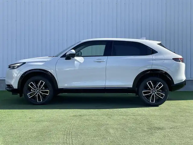 ホンダ ヴェゼル ハイブリッド e:HEV Z 香川県 2025(令7)年 0.1千km プラチナホワイトパール 登録済未使用車/純正９型ナビ/ワイヤレス充電器/バックカメラ/ビルトインＥＴＣ２．０/ホンダセンシング/レーダークルーズコントロール/ＢＳＭ/パドルシフト/ハンドルヒーター/シートヒーター/ハーフレザーシート/スペアキー/スマートキー