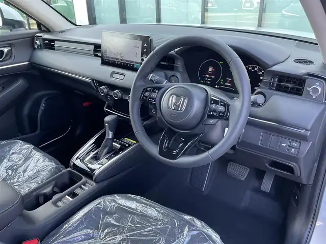 ホンダ ヴェゼル ハイブリッド e:HEV Z 香川県 2025(令7)年 0.1千km プラチナホワイトパール 登録済未使用車/純正９型ナビ/ワイヤレス充電器/バックカメラ/ビルトインＥＴＣ２．０/ホンダセンシング/レーダークルーズコントロール/ＢＳＭ/パドルシフト/ハンドルヒーター/シートヒーター/ハーフレザーシート/スペアキー/スマートキー