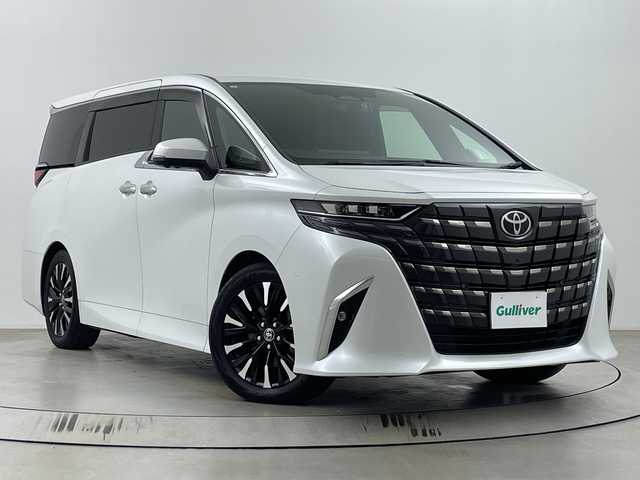 トヨタ アルファードハイブリット Z 埼玉県 2024(令6)年 2.9万km プラチナホワイトパールマイカ 純正ディスプレイオーディオ/　(Bluetooth/Miracast/USB/FM/AM)/純正フリップダウンモニター/フルセグテレビ/全方位カメラ/ビルトインETC2.0/前後ドライブレコーダー/パワーバックドア/両側パワースライドドア/ガラスルーフ/レザーシート/デジタルインナーミラー/シートヒーター/エアーシート/パワーシート/ステアリングヒーター/パーキングアシスト/パドルシフト/ブラインドスポットモニター/クルーズコントロール/衝突被害軽減ブレーキ/車線逸脱警報/クリアランスソナー/電子パーキングシステム/ブレーキホールド/シートメモリー/オートハイビーム/オートLEDライト/プッシュスタート/純正フロアマット/純正19インチアルミホイール