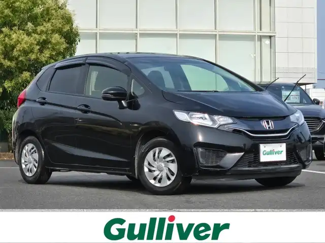 ホンダ フィット 13G Fパッケージ 鹿児島県 2015(平27)年 6.1万km クリスタルブラックパール CDプレイヤー/FM/AM/AUX/シガーソケット/パワーウィンドウ/パワーステアリング/スペアキー/ドアバイザー/電動格納ミラー/スマートキー/プッシュスタート/オートAC/Wエアバック/横滑り防止装置/純正フロアマット/ワンオーナー/ABS/アイドリングストップ/盗難防止装置