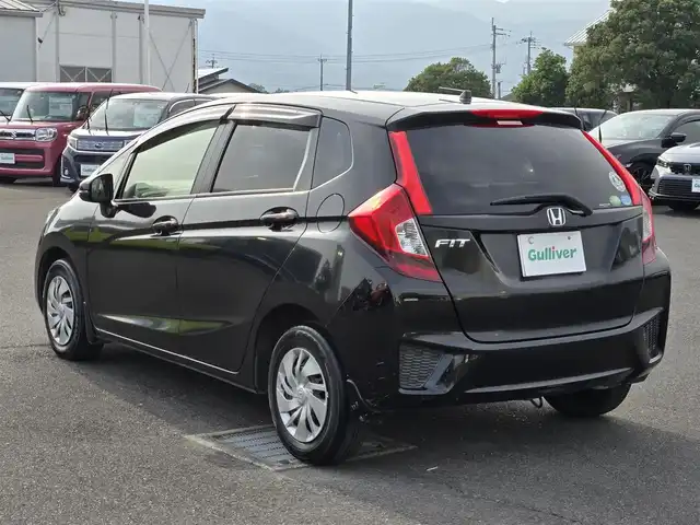 ホンダ フィット 13G Fパッケージ 鹿児島県 2015(平27)年 6.1万km クリスタルブラックパール CDプレイヤー/FM/AM/AUX/シガーソケット/パワーウィンドウ/パワーステアリング/スペアキー/ドアバイザー/電動格納ミラー/スマートキー/プッシュスタート/オートAC/Wエアバック/横滑り防止装置/純正フロアマット/ワンオーナー/ABS/アイドリングストップ/盗難防止装置