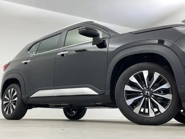 ホンダ ＷＲ－Ｖ Z+ 新潟県 2024(令6)年 0.1万km クリスタルブラックパール 純正メモリナビ/ホンダセンシング/・衝突被害軽減ブレーキ/・先行車発進お知らせ機能/・歩行者事故低減ステアリング/・路外逸脱抑制機能/・標識認識機能/・アダプティブクルーズコントロール/・車線維持支援システム/・誤発進抑制機能/・後方誤発進抑制機能/・近距離衝突軽減ブレーキ/・急アクセル抑制機能/・パーキングセンサーシステム/・オートハイビーム/フルセグTV/Bluetooth/バックカメラ/レーダークルーズコントロール/パドルシフト/ハーフレザーシート/シートヒーター/ルーフレール/LEDヘッドライト