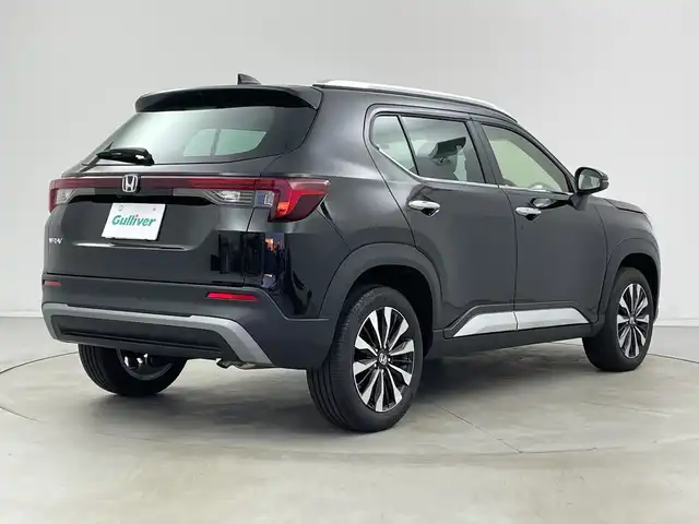 ホンダ ＷＲ－Ｖ Z+ 新潟県 2024(令6)年 0.1万km クリスタルブラックパール 純正メモリナビ/ホンダセンシング/・衝突被害軽減ブレーキ/・先行車発進お知らせ機能/・歩行者事故低減ステアリング/・路外逸脱抑制機能/・標識認識機能/・アダプティブクルーズコントロール/・車線維持支援システム/・誤発進抑制機能/・後方誤発進抑制機能/・近距離衝突軽減ブレーキ/・急アクセル抑制機能/・パーキングセンサーシステム/・オートハイビーム/フルセグTV/Bluetooth/バックカメラ/レーダークルーズコントロール/パドルシフト/ハーフレザーシート/シートヒーター/ルーフレール/LEDヘッドライト