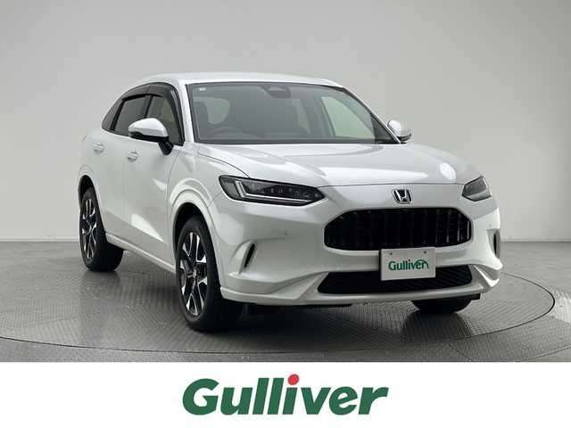 ホンダ ＺＲ－Ｖ ハイブリッド e:HEV Z 兵庫県 2024(令6)年 0.6万km プラチナホワイトパール 純正ディスプレイオーディオ/（ナビ、フルセグTV、BT、スマートフォン連携）/後退出庫サポート/シートヒーター/パワーシート/レザーシート/ワイヤレス充電/純正フロアマット/ドアバイザー/LEDヘッドライト/コーナーセンサー/追従式クルーズコントロール/レーンキープアシスト/ブラインドスポットモニター/パワーバックドア/BOSEサウンド/ビルトインETC2.0/パドルシフト/オートハイビーム/マルチビューカメラ