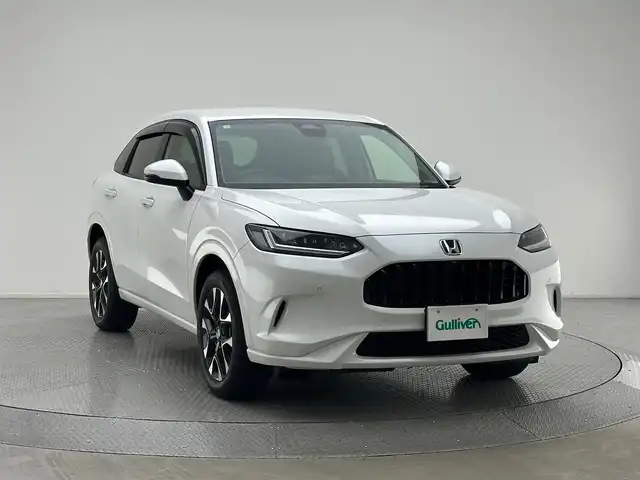 ホンダ ＺＲ－Ｖ ハイブリッド e:HEV Z 兵庫県 2024(令6)年 0.6万km プラチナホワイトパール 純正ディスプレイオーディオ/（ナビ、フルセグTV、BT、スマートフォン連携）/後退出庫サポート/シートヒーター/パワーシート/レザーシート/ワイヤレス充電/純正フロアマット/ドアバイザー/LEDヘッドライト/コーナーセンサー/追従式クルーズコントロール/レーンキープアシスト/ブラインドスポットモニター/パワーバックドア/BOSEサウンド/ビルトインETC2.0/パドルシフト/オートハイビーム/マルチビューカメラ