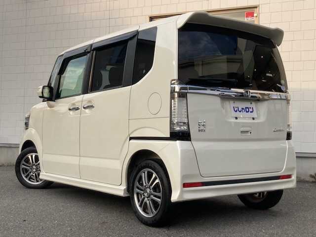 ホンダ Ｎ ＢＯＸ カスタム G Lパッケージ 三重県 2013(平25)年 6.9万km プレミアムホワイトパール (株)IDOMが運営する【じしゃロン四日市店】の自社ローン専用車両になります。こちらは現金またはオートローンご利用時の価格です。自社ローンご希望の方は別途その旨お申付け下さい/社外SDナビ（CD/DVD/AM/FM）/パドルシフト/片側パワースライド/バックカメラ/ワンセグTV/ETC/純正14インチAW/キセノンライト/ベンチシート