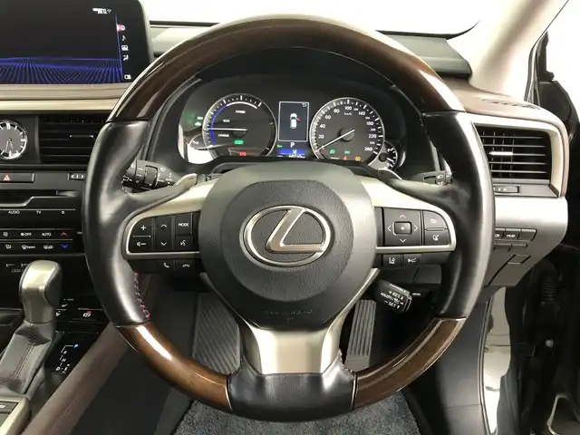 レクサス ＲＸ 450hL 愛知県 2020(令2)年 6.1万km グラファイトブラックガラスフレーク モデリスタエアロ/サンルーフ/純正ナビ/（AF/FM/CD/DVD/SD/サウンドライブラリ/Bluetooth/フルセグTV）/衝突軽減ブレーキ/横滑り防止/レーンキープ/オートホールド/クルーズコントロール追従あり/電子パーキング/電動リアゲート/ヘッドアップディスプレイ/オートライト/オートマチックハイビーム/フォグランプ/ブラインドスポットモニター/ハンドルヒーター/パドルシフト/ハンズフリー/シートメモリー/パワーシート/ヒートシーター/ベンチレーション/アラウンドビューバックモニター/ドライブレコーダー（前後）/ビルドインETC/純正フロアマット/純正アルミホイール/プッシュスタート/LEDライト/ルーフレール