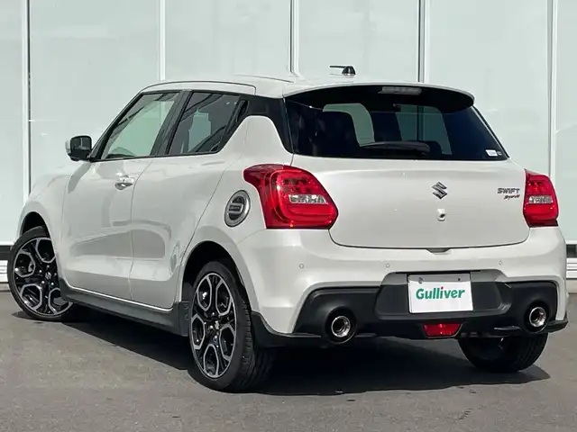 スズキ スイフト スポーツ 神奈川県 2023(令5)年 2.1万km ピュアホワイトP KENOWOOD製8V型SDナビ（MPV-S708L）/Bluetooth/CD/DVD/iPod/フルセグ/USB/全周囲カメラ/アクティブクルーズコントロール/純正エアロ/デジタルインナーミラー/ブラインドスポットモニター/シートヒーター/パドルシフト/専用フットペダル/専用シート/純正アルミホイール/LEDヘッドライト/ETC/コーナーセンサー/デュアルセンサーブレーキサポート/アイドリングストップ/レーンキープアシスト/横滑り防止装置/カーテンエアバック