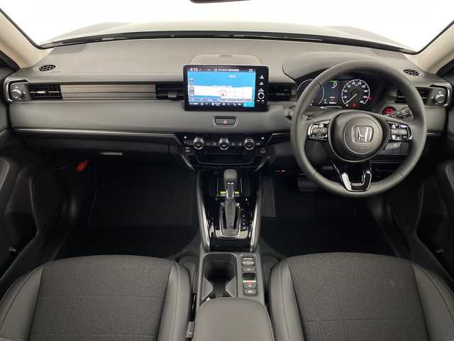 ホンダ ヴェゼル ハイブリッド e:HEV Z 鹿児島県 2025(令7)年 0.1千km クリスタルブラックパール 登録済未使用車/ホンダセンシング/レーダークルーズコントロール/ビルトインETC2・0/バックカメラ/純正ナビ/(BT/AM/FM/フルセグTV)/Applecarplay/Androidauto/革巻きステアリング/ステアリングスイッチ/ステアリングヒーター/電動リアゲート/チップアップシート/ハーフレザーシート/前席シートヒーター/純正18インチアルミホイール/レーンキープアシスト/オートマチックハイビーム/ブラインドスポットモニター/純正LEDヘッドライト/ワイヤレス充電/電動パーキングブレーキ/オートホールド/前後コーナーセンサー/保証書/取扱説明書/スペアキー