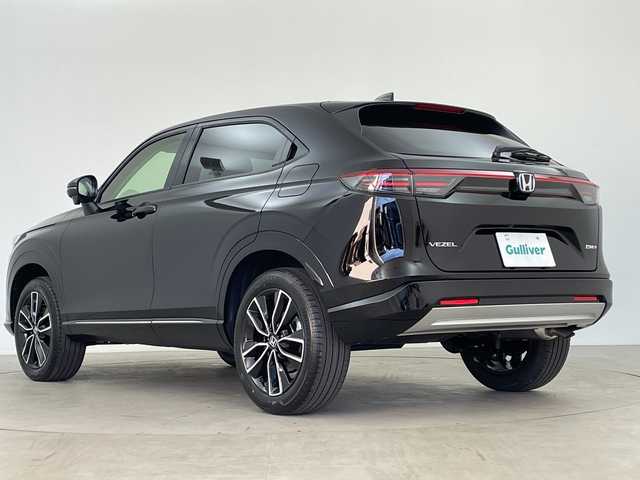 ホンダ ヴェゼル ハイブリッド e:HEV Z 鹿児島県 2025(令7)年 0.1千km クリスタルブラックパール 登録済未使用車/ホンダセンシング/レーダークルーズコントロール/ビルトインETC2・0/バックカメラ/純正ナビ/(BT/AM/FM/フルセグTV)/Applecarplay/Androidauto/革巻きステアリング/ステアリングスイッチ/ステアリングヒーター/電動リアゲート/チップアップシート/ハーフレザーシート/前席シートヒーター/純正18インチアルミホイール/レーンキープアシスト/オートマチックハイビーム/ブラインドスポットモニター/純正LEDヘッドライト/ワイヤレス充電/電動パーキングブレーキ/オートホールド/前後コーナーセンサー/保証書/取扱説明書/スペアキー