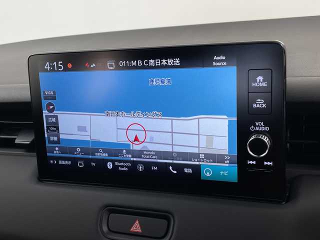 ホンダ ヴェゼル ハイブリッド e:HEV Z 鹿児島県 2025(令7)年 0.1千km クリスタルブラックパール 登録済未使用車/ホンダセンシング/レーダークルーズコントロール/ビルトインETC2・0/バックカメラ/純正ナビ/(BT/AM/FM/フルセグTV)/Applecarplay/Androidauto/革巻きステアリング/ステアリングスイッチ/ステアリングヒーター/電動リアゲート/チップアップシート/ハーフレザーシート/前席シートヒーター/純正18インチアルミホイール/レーンキープアシスト/オートマチックハイビーム/ブラインドスポットモニター/純正LEDヘッドライト/ワイヤレス充電/電動パーキングブレーキ/オートホールド/前後コーナーセンサー/保証書/取扱説明書/スペアキー