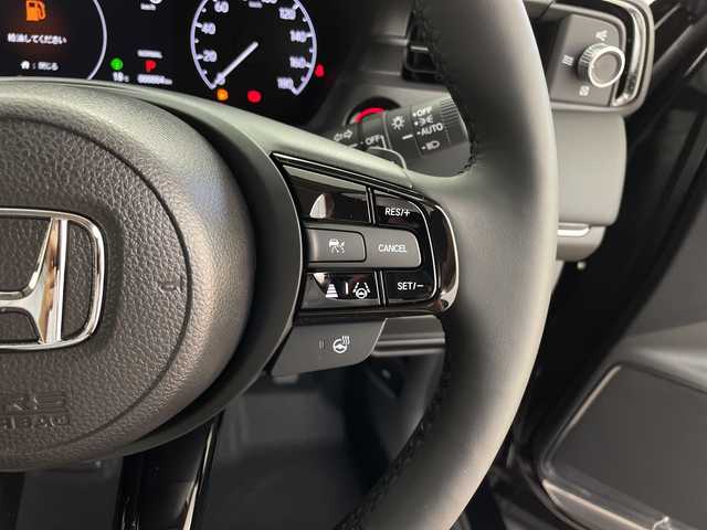 ホンダ ヴェゼル ハイブリッド e:HEV Z 鹿児島県 2025(令7)年 0.1千km クリスタルブラックパール 登録済未使用車/ホンダセンシング/レーダークルーズコントロール/ビルトインETC2・0/バックカメラ/純正ナビ/(BT/AM/FM/フルセグTV)/Applecarplay/Androidauto/革巻きステアリング/ステアリングスイッチ/ステアリングヒーター/電動リアゲート/チップアップシート/ハーフレザーシート/前席シートヒーター/純正18インチアルミホイール/レーンキープアシスト/オートマチックハイビーム/ブラインドスポットモニター/純正LEDヘッドライト/ワイヤレス充電/電動パーキングブレーキ/オートホールド/前後コーナーセンサー/保証書/取扱説明書/スペアキー