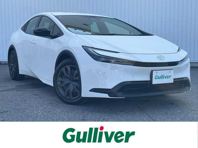 トヨタ プリウス X 滋賀県 2023(令5)年 2.6万km スーパーホワイトⅡ 純正8インチディスプレイオーディオ/(フルセグTV Bluetooth MiraCast)/トヨタセーフティセンス/・プリクラッシュセーフティ/・レーントレーシングアシスト/・車線逸脱警報/・レーダークルーズコントロール/・ブラインドスポットモニター/バックカメラ/ETC2.0/プッシュスタート/スマートキー/革巻きステアリング/ステアリングリモコン/純正フロアマット/LEDヘッドライト/オートマチックハイビーム