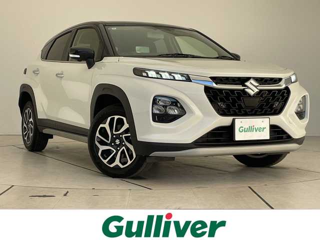 スズキ フロンクス 愛知県 2024(令6)年 1万km 白 スズキセーフティサポート/純正9型ディスプレイオーディオナビ/全方位カメラ/レーダークルーズコントロール/シートヒーター/ヘッドアップディスプレイ/ブラインドスポットモニター/パドルシフト/ワイヤレス充電機/コーナーセンサー/純正アルミホイール/LEDヘッドライト/衝突軽減システム/フルセグ/Bluetooth/ステアリングスイッチ/スマートキー/プッシュスタート