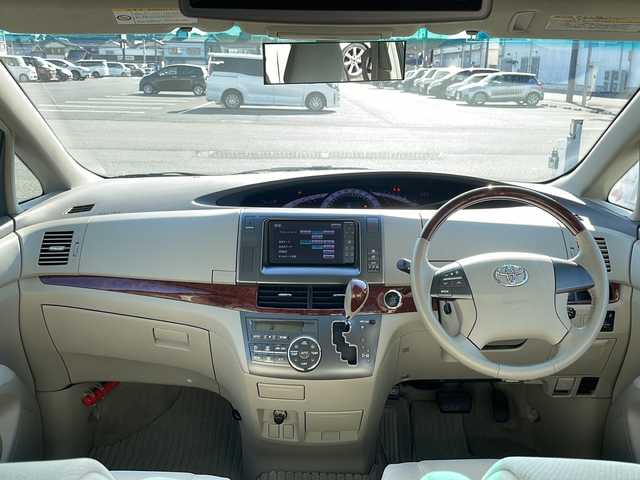 トヨタ エスティマ アエラス Gエディション 島根県 2011(平23)年 8.7万km ホワイトパールクリスタルシャイン 純正ナビ/フルセグTV/CD/DVD/Bluetooth接続/純正フリップダウンモニター/バックカメラ/両側パワースライドドア/オットマン/ＭＴモード付きＡＴ/ビルトインETC/クルーズコントロール/プッシュスタート