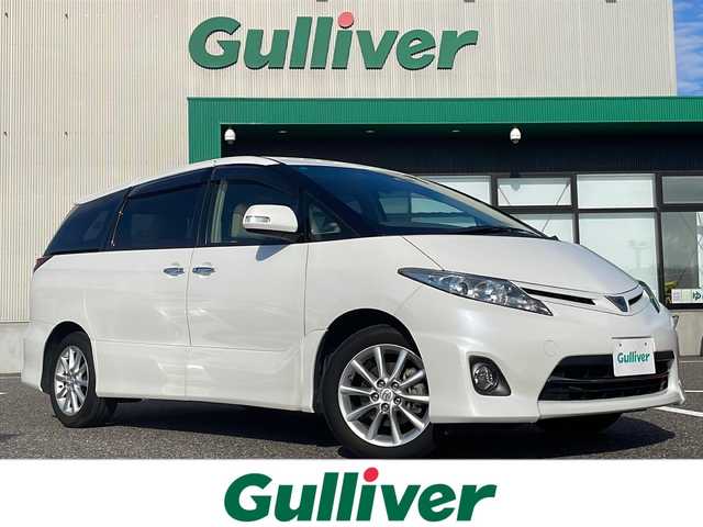 トヨタ エスティマ アエラス Gエディション 島根県 2011(平23)年 8.7万km ホワイトパールクリスタルシャイン 純正ナビ/フルセグTV/CD/DVD/Bluetooth接続/純正フリップダウンモニター/バックカメラ/両側パワースライドドア/オットマン/ＭＴモード付きＡＴ/ビルトインETC/クルーズコントロール/プッシュスタート