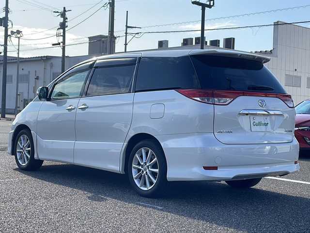 トヨタ エスティマ アエラス Gエディション 島根県 2011(平23)年 8.7万km ホワイトパールクリスタルシャイン 純正ナビ/フルセグTV/CD/DVD/Bluetooth接続/純正フリップダウンモニター/バックカメラ/両側パワースライドドア/オットマン/ＭＴモード付きＡＴ/ビルトインETC/クルーズコントロール/プッシュスタート