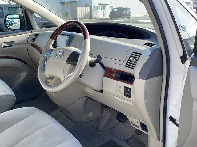 トヨタ エスティマ アエラス Gエディション 島根県 2011(平23)年 8.7万km ホワイトパールクリスタルシャイン 純正ナビ/フルセグTV/CD/DVD/Bluetooth接続/純正フリップダウンモニター/バックカメラ/両側パワースライドドア/オットマン/ＭＴモード付きＡＴ/ビルトインETC/クルーズコントロール/プッシュスタート