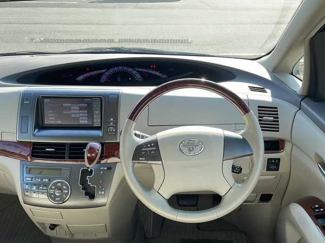 トヨタ エスティマ アエラス Gエディション 島根県 2011(平23)年 8.7万km ホワイトパールクリスタルシャイン 純正ナビ/フルセグTV/CD/DVD/Bluetooth接続/純正フリップダウンモニター/バックカメラ/両側パワースライドドア/オットマン/ＭＴモード付きＡＴ/ビルトインETC/クルーズコントロール/プッシュスタート
