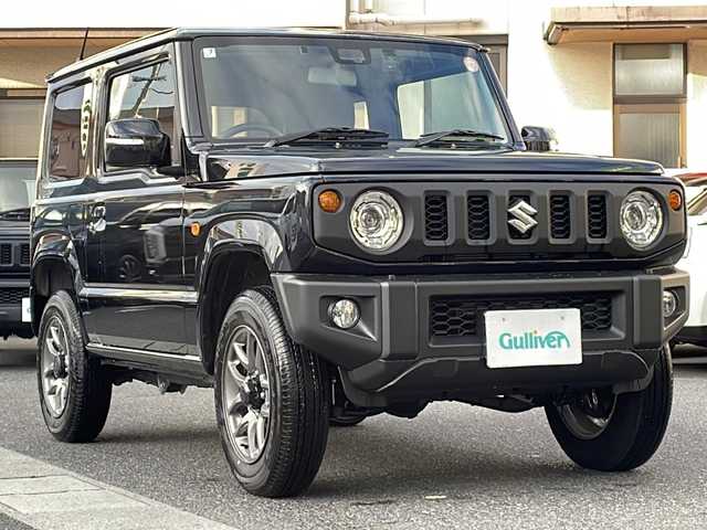 スズキ ジムニー XC 岡山県 2025(令7)年 0.2万km ブルーイッシュブラックパール3 登録時走行距離1485km/社外SDナビ/(AM/FM/BT/TV)/バックカメラ/ビルトインETC/ドライブレコーダー/衝突被害軽減システム/ダウンヒルアシストコントロール/クルーズコントロール/アイドリングストップ/シートヒーター/背面タイヤ/プッシュスタート/スマートキー/スペアキー/純正16インチアルミホイール