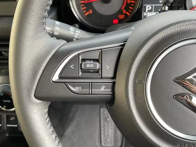 スズキ ジムニー XC 岡山県 2025(令7)年 0.2万km ブルーイッシュブラックパール3 登録時走行距離1485km/社外SDナビ/(AM/FM/BT/TV)/バックカメラ/ビルトインETC/ドライブレコーダー/衝突被害軽減システム/ダウンヒルアシストコントロール/クルーズコントロール/アイドリングストップ/シートヒーター/背面タイヤ/プッシュスタート/スマートキー/スペアキー/純正16インチアルミホイール