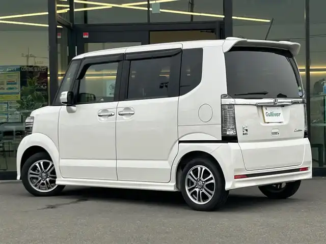 ホンダ Ｎ ＢＯＸ カスタム G Lパッケージ 東京都 2016(平28)年 3.4万km プレミアムホワイトパールⅡ 純正ナビ　AVIC-RZ22/フルセグTV/バックカメラ/ETC/両側パワースライドドア/アレルクリーンシート/後席ロールサンシェード/シートバックテーブル/14インチ純正アルミホイール/純正フロアマット/横滑り防止装置/衝突軽減システム/キセノンヘッドライト/オートライト