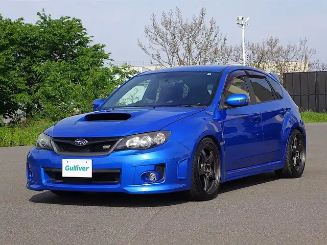 スバル インプレッサ ＷＲＸ STi 山形県 2014(平26)年 9万km WRブルーマイカ 4WD/メモリナビ/　　【CD DVD BT フルセグ】/HIDオートヘッドライト/ハーフレザーシート/パワーシート/AME18インチアルミホイール/ドライブレコーダー/ターボ/電動格納ウィンカーミラー/フォグランプ/スマートキー/ETC/積込タイヤ/　　【純正AW 245/40/R18 スタッドレス 6mm ’20】