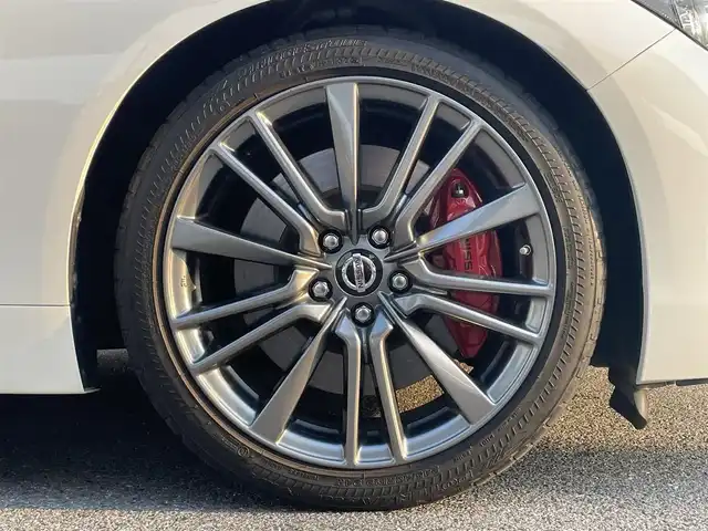 日産 スカイライン 400R 栃木県 2019(令1)年 7.5万km ブリリアントホワイトパール 純正ナビ（CD/DVD/TV/BT）/BOSEサウンド/走行中TV視聴可能/アラウンドビューカメラ/ETC2.0/パドルシフト/前席パワーシート/シートヒーター/クルーズコントロール/エマージェンシーブレーキ/後側方支援/車線逸脱警報/クルーズコントロール/コーナーセンサー/保証書/取説/スペアキー
