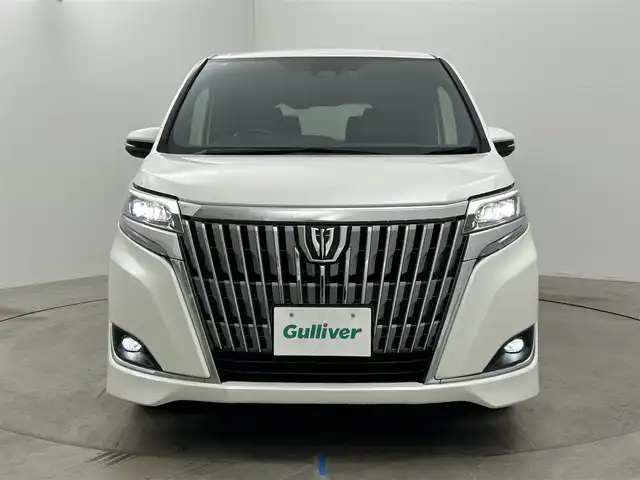 トヨタ エスクァイア Gi 岡山県 2018(平30)年 4.5万km ホワイトパールクリスタルシャイン 純正9インチナビ/・FM/AM/Bluetooth/フルセグ/CD/DVD/バックカメラ/12.1インチ後席モニター/合皮シート/・シートヒーター/ドライブレコーダー/ビルトインETC/両側パワースライドドア/トヨタセーフティーセンス/・プリクラッシュセーフティ/・レーンキープアシスト/・クルーズコントロール/・オートマチックハイビーム/LEDヘッドライト/純正フロアマット/純正15インチアルミ/ドアバイザー/スマートキー2本/新車保証書