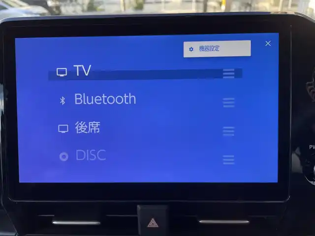 トヨタ ヴォクシー ハイブリッド S－Z 福岡県 2025(令7)年 0.4万km ホワイトパールクリスタルシャイン ワンオーナー/純正ディーラーナビ/・Bluetooth/・フルセグTV/・AM/FM/・ミラーキャスト/・CD/DVD/・USB/フリップダウンモニター/レーダークルーズコントロール/レーンキープアシスト/オートホールド/横滑り防止システム/ドライブモード/両側パワースライドドア/シートヒーター/オートライト/電動格納ミラー/社外フロアマット/純正アルミホイール/ビルトインETC/ドライブレコーダー前後/デジタルインナーミラー/プッシュスタート/取扱説明書/保証書/スペアキー×１