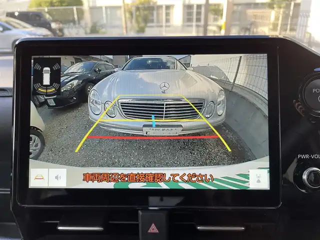 トヨタ ヴォクシー ハイブリッド S－Z 福岡県 2025(令7)年 0.4万km ホワイトパールクリスタルシャイン ワンオーナー/純正ディーラーナビ/・Bluetooth/・フルセグTV/・AM/FM/・ミラーキャスト/・CD/DVD/・USB/フリップダウンモニター/レーダークルーズコントロール/レーンキープアシスト/オートホールド/横滑り防止システム/ドライブモード/両側パワースライドドア/シートヒーター/オートライト/電動格納ミラー/社外フロアマット/純正アルミホイール/ビルトインETC/ドライブレコーダー前後/デジタルインナーミラー/プッシュスタート/取扱説明書/保証書/スペアキー×１