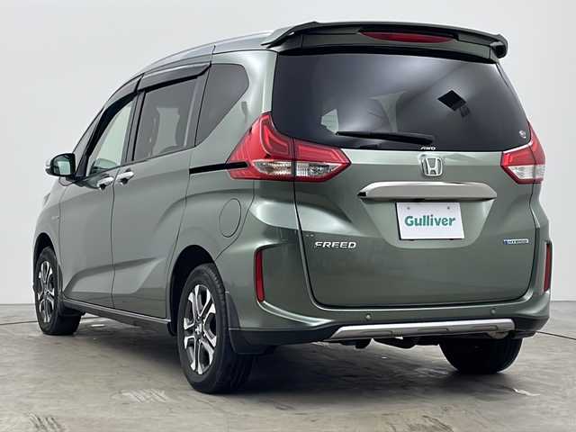 ホンダ フリード ハイブリット クロスター ホンダセンシング 秋田県 2020(令2)年 3.9万km シルバーミストグリーンM ４WD/社外SDナビ(Bluetooth/CD/DVD/フルセグ)/バックカメラ/ビルトインETC/クルーズコントロール/車線逸脱警報/後方コーナーセンサー/両側パワースライドドア/純正AW/前後ドライブレコーダー/衝突被害軽減システム/運転席シートヒーター/カーテンエアバック/サンシェード/リアデアイサー/USB入力端子/LEDヘッドライト/スマートキー