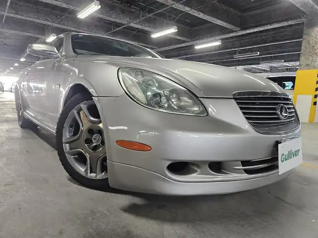 トヨタ ソアラ 430SCV ノーブルカラーED 長崎県 2005(平17)年 9.4万km コスモシルバー 純正ナビ/TV/マークレビンソンプレミアムサウンド/バックカメラ/クルーズコントロール/横滑り防止装置/HIDヘッドランプ/オートライト/オートエアコン/本木製/革巻きコンビステアリング/ステアリングスイッチ/ノーブルレッド革シート/前席パワーシート/ポジションメモリー/前席シートヒーター/社外18インチAWスタッドレス/リモコンキー/イモビライザー/オートアラーム/禁煙車