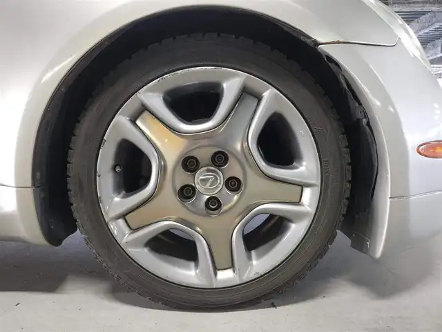 トヨタ ソアラ 430SCV ノーブルカラーED 長崎県 2005(平17)年 9.4万km コスモシルバー 純正ナビ/TV/マークレビンソンプレミアムサウンド/バックカメラ/クルーズコントロール/横滑り防止装置/HIDヘッドランプ/オートライト/オートエアコン/本木製/革巻きコンビステアリング/ステアリングスイッチ/ノーブルレッド革シート/前席パワーシート/ポジションメモリー/前席シートヒーター/社外18インチAWスタッドレス/リモコンキー/イモビライザー/オートアラーム/禁煙車