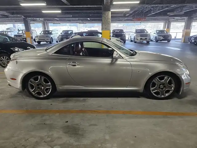 トヨタ ソアラ 430SCV ノーブルカラーED 長崎県 2005(平17)年 9.4万km コスモシルバー 純正ナビ/TV/マークレビンソンプレミアムサウンド/バックカメラ/クルーズコントロール/横滑り防止装置/HIDヘッドランプ/オートライト/オートエアコン/本木製/革巻きコンビステアリング/ステアリングスイッチ/ノーブルレッド革シート/前席パワーシート/ポジションメモリー/前席シートヒーター/社外18インチAWスタッドレス/リモコンキー/イモビライザー/オートアラーム/禁煙車