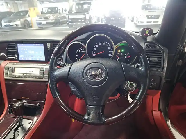 トヨタ ソアラ 430SCV ノーブルカラーED 長崎県 2005(平17)年 9.4万km コスモシルバー 純正ナビ/TV/マークレビンソンプレミアムサウンド/バックカメラ/クルーズコントロール/横滑り防止装置/HIDヘッドランプ/オートライト/オートエアコン/本木製/革巻きコンビステアリング/ステアリングスイッチ/ノーブルレッド革シート/前席パワーシート/ポジションメモリー/前席シートヒーター/社外18インチAWスタッドレス/リモコンキー/イモビライザー/オートアラーム/禁煙車