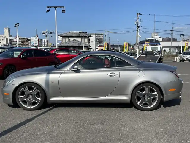 トヨタ ソアラ 430SCV ノーブルカラーED 長崎県 2005(平17)年 9.4万km コスモシルバー 純正ナビ/TV/マークレビンソンプレミアムサウンド/バックカメラ/クルーズコントロール/横滑り防止装置/HIDヘッドランプ/オートライト/オートエアコン/本木製/革巻きコンビステアリング/ステアリングスイッチ/ノーブルレッド革シート/前席パワーシート/ポジションメモリー/前席シートヒーター/社外18インチAWスタッドレス/リモコンキー/イモビライザー/オートアラーム/禁煙車