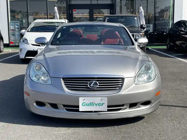 トヨタ ソアラ 430SCV ノーブルカラーED 長崎県 2005(平17)年 9.4万km コスモシルバー 純正ナビ/TV/マークレビンソンプレミアムサウンド/バックカメラ/クルーズコントロール/横滑り防止装置/HIDヘッドランプ/オートライト/オートエアコン/本木製/革巻きコンビステアリング/ステアリングスイッチ/ノーブルレッド革シート/前席パワーシート/ポジションメモリー/前席シートヒーター/社外18インチAWスタッドレス/リモコンキー/イモビライザー/オートアラーム/禁煙車