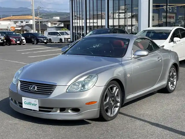 トヨタ ソアラ 430SCV ノーブルカラーED 長崎県 2005(平17)年 9.4万km コスモシルバー 純正ナビ/TV/マークレビンソンプレミアムサウンド/バックカメラ/クルーズコントロール/横滑り防止装置/HIDヘッドランプ/オートライト/オートエアコン/本木製/革巻きコンビステアリング/ステアリングスイッチ/ノーブルレッド革シート/前席パワーシート/ポジションメモリー/前席シートヒーター/社外18インチAWスタッドレス/リモコンキー/イモビライザー/オートアラーム/禁煙車