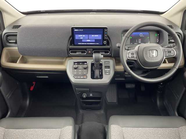 ホンダ フリード ハイブリット e:HEV AIR EX 大阪府 2025(令7)年 0.1千km クリスタルブラックパール ホンダセンシング/　・衝突被害軽減ブレーキ/　・先行者発進お知らせ機能/　・歩行者事故低減ステアリング/　・路外逸脱抑制機能/　・標識認識機能/　・渋滞追従機能付アダプティブクルーズコントロール/　・車線維持支援システム/　・トラフィックジャムアシスト/　・ブラインドスポットインフォメーション/　・誤発進抑制機能/　・後方誤発進抑制機能/　・オートハイビーム/純正メモリナビ/　　BT/フルセグTV/バックカメラ/両側パワースライドドア/LEDオートライト/シートヒーター/純正15インチアルミホイール/コーナーセンサー/電動パーキング/ブレーキホールド/スマートキー