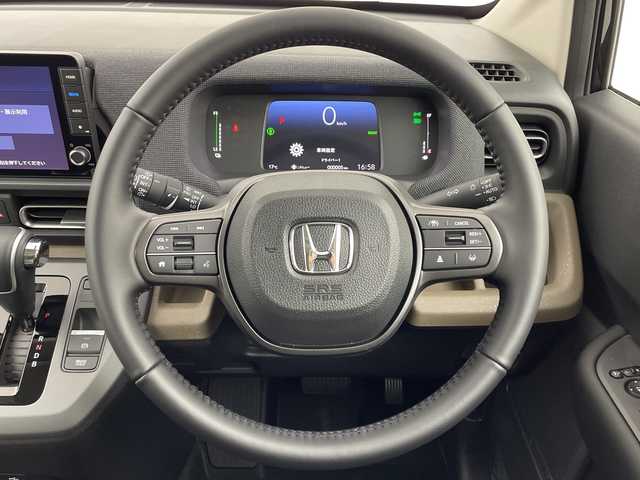 ホンダ フリード ハイブリット e:HEV AIR EX 大阪府 2025(令7)年 0.1千km クリスタルブラックパール ホンダセンシング/　・衝突被害軽減ブレーキ/　・先行者発進お知らせ機能/　・歩行者事故低減ステアリング/　・路外逸脱抑制機能/　・標識認識機能/　・渋滞追従機能付アダプティブクルーズコントロール/　・車線維持支援システム/　・トラフィックジャムアシスト/　・ブラインドスポットインフォメーション/　・誤発進抑制機能/　・後方誤発進抑制機能/　・オートハイビーム/純正メモリナビ/　　BT/フルセグTV/バックカメラ/両側パワースライドドア/LEDオートライト/シートヒーター/純正15インチアルミホイール/コーナーセンサー/電動パーキング/ブレーキホールド/スマートキー