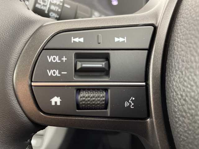 ホンダ フリード ハイブリット e:HEV AIR EX 大阪府 2025(令7)年 0.1千km クリスタルブラックパール ホンダセンシング/　・衝突被害軽減ブレーキ/　・先行者発進お知らせ機能/　・歩行者事故低減ステアリング/　・路外逸脱抑制機能/　・標識認識機能/　・渋滞追従機能付アダプティブクルーズコントロール/　・車線維持支援システム/　・トラフィックジャムアシスト/　・ブラインドスポットインフォメーション/　・誤発進抑制機能/　・後方誤発進抑制機能/　・オートハイビーム/純正メモリナビ/　　BT/フルセグTV/バックカメラ/両側パワースライドドア/LEDオートライト/シートヒーター/純正15インチアルミホイール/コーナーセンサー/電動パーキング/ブレーキホールド/スマートキー