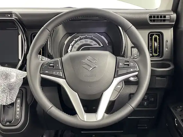 スズキ ハスラー HYBRID X 新潟県 2025(令7)年 0.1千km クールカーキパールメタリック/ソフトベージュメタリック HV　X　4WD　/全方位モニター付きナビゲーション/・CD/DVD/・Bluetooth/・フルセグTV/・スマートフォン連携/＝＝＝/セーフティサポート/・デュアルカメラブレーキサポート/・誤発進抑制機能/・車線逸脱警報/・ふらつき警報/・先行車発進お知らせ機能/・ハイビームアシスト/・標識認識機能/・後退時ブレーキサポート/・後方誤発進抑制機能/リアパーキングセンサー/シートヒーター/革巻きステアリング/ステアリングスイッチ/LEDヘッドライト/フォグランプ/オートライト/スマートキー＆プッシュスタート/スペアキー/電動格納ミラー/純正15インチAW/W/サイド/カーテンエアバッグ/取扱説明書/保証書