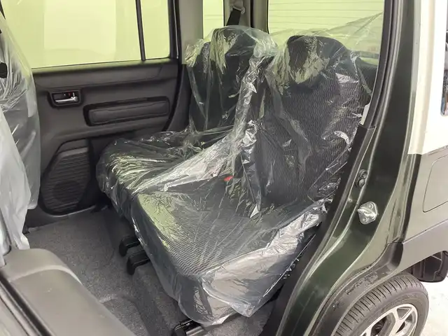 スズキ ハスラー HYBRID X 新潟県 2025(令7)年 0.1千km クールカーキパールメタリック/ソフトベージュメタリック HV　X　4WD　/全方位モニター付きナビゲーション/・CD/DVD/・Bluetooth/・フルセグTV/・スマートフォン連携/＝＝＝/セーフティサポート/・デュアルカメラブレーキサポート/・誤発進抑制機能/・車線逸脱警報/・ふらつき警報/・先行車発進お知らせ機能/・ハイビームアシスト/・標識認識機能/・後退時ブレーキサポート/・後方誤発進抑制機能/リアパーキングセンサー/シートヒーター/革巻きステアリング/ステアリングスイッチ/LEDヘッドライト/フォグランプ/オートライト/スマートキー＆プッシュスタート/スペアキー/電動格納ミラー/純正15インチAW/W/サイド/カーテンエアバッグ/取扱説明書/保証書