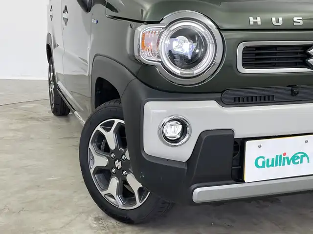 スズキ ハスラー HYBRID X 新潟県 2025(令7)年 0.1千km クールカーキパールメタリック/ソフトベージュメタリック HV　X　4WD　/全方位モニター付きナビゲーション/・CD/DVD/・Bluetooth/・フルセグTV/・スマートフォン連携/＝＝＝/セーフティサポート/・デュアルカメラブレーキサポート/・誤発進抑制機能/・車線逸脱警報/・ふらつき警報/・先行車発進お知らせ機能/・ハイビームアシスト/・標識認識機能/・後退時ブレーキサポート/・後方誤発進抑制機能/リアパーキングセンサー/シートヒーター/革巻きステアリング/ステアリングスイッチ/LEDヘッドライト/フォグランプ/オートライト/スマートキー＆プッシュスタート/スペアキー/電動格納ミラー/純正15インチAW/W/サイド/カーテンエアバッグ/取扱説明書/保証書