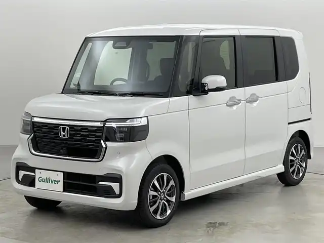 ホンダ Ｎ ＢＯＸ カスタム 福岡県 2024(令6)年 0.1万km未満 白 純正ナビ（ＢＴ，ＴＶ）　/バックカメラ　/コーナーセンサー　/ＡＣＣ　/衝突被害軽減ブレーキ　/レーンキープ　/アクセル踏み間違い防止　/片側電動スライドドア　/シートヒーター　/ローダウン　/純正１４インチＡＷ　/ＬＥＤ