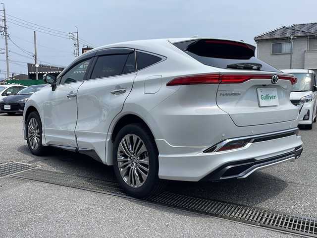 トヨタ ハリアー Z レザーパッケージ 岐阜県 2023(令5)年 0.9万km プラチナホワイトパールマイカ ワンオーナー/12インチメーカー純正ナビ/(BT/フルセグTV/FM/AM)/JBLプレミアムサウンド/モデリスタエアロ/トヨタセーフティセンス/(レーダークルーズコントロール)/(アダプティブハイビームシステム)/(オートマチックハイビーム)/(プリクラッシュセーフティ)/(レーントレーシングアシスト)/(ロードサインアシスト)/(ドライバー異常時対応システム)/(先行車発進告知機能)/デジタルインナーミラー/シートヒーター/シートベンチレーション/ステリングヒーター/パワーバックドア/ETC/プッシュスタート/純正フロアマット/ドアバイザー/取説/保証書