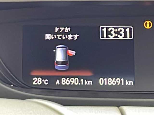 ホンダ フリード ハイブリット G 鹿児島県 2022(令4)年 1.9万km クリスタルブラックパール 純正９型ナビ　/（フルセグ/Ｂｌｕｅｔｏｏｔｈ/CD/DVD)　/アダプティブクルーズコントロール　/両側パワースライドドア　/バックカメラ　/オートライト　/ステアリングリモコン　/ビルドインＥＴＣ　/リアサンシェード　/シートヒーター/LEDヘッドライト/保証書/取扱説明書